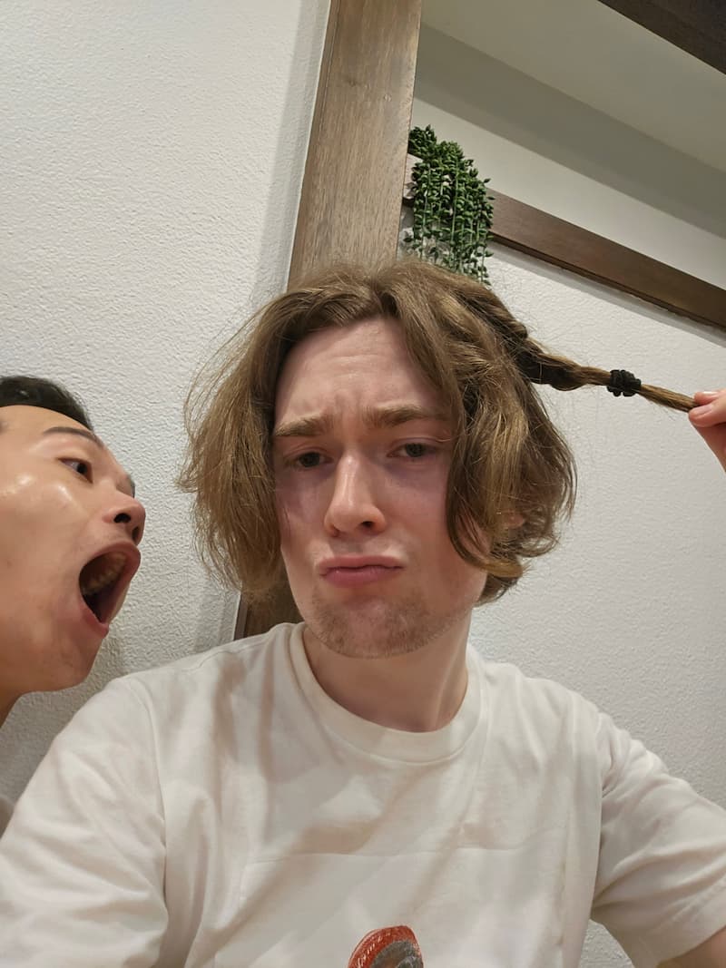Playful selfie with Mark Tran pretending to bite my face